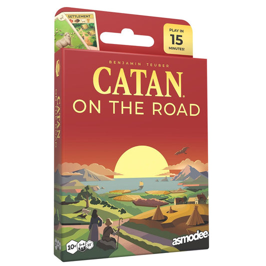 Board game box for 'Catan on the Road' by Asmodee with sunset landscape illustration.